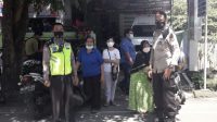 Personil Polsek Makassar Kawal Giat Vaksinasi Covid-19