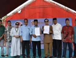 Muhammad Zaini Teken MoU Perikatan Persaudaraan dengan Rumpun Bacukiki di Situs Batu Kiki’e