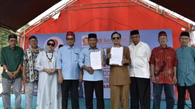 Muhammad Zaini Teken MoU Perikatan Persaudaraan dengan Rumpun Bacukiki di Situs Batu Kiki’e