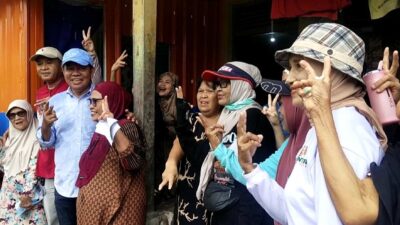 Niat Mengabdi untuk Ibadah, Guyuran Hujan Tak Menyurutkan Semangat MZ Menyapa Warga Ujung Bulu